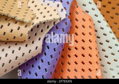 Set of colorful samples of fashion matte perforated genuine leather. Stock Photo