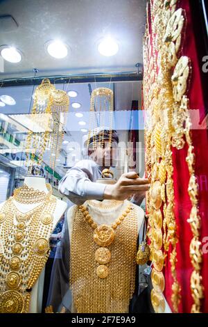 DUBAI,UAE - FEBRUARY 2018: gold and jewel are sold in the Dubai souk. Gold souk consists of 300 retailers. Stock Photo