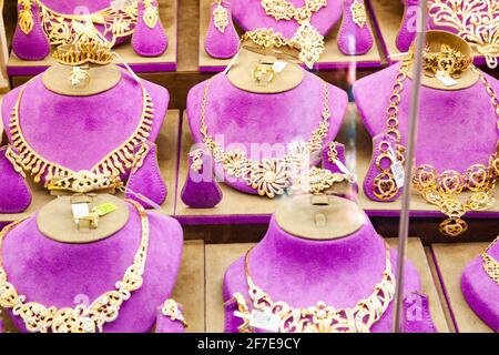 DUBAI,UAE - FEBRUARY 2018: gold and jewel are sold in the Dubai souk. Gold souk consists of 300 retailers. Stock Photo