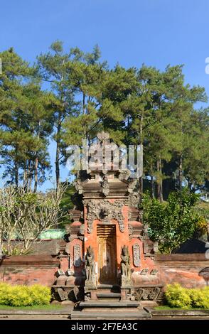 Gate featuring Bhoma at Tirta Empul temple in Bali, Indonesia. Stock Photo