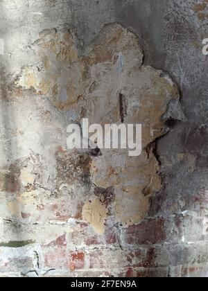 old dirty brick wall with scratches and scuffs Stock Photo