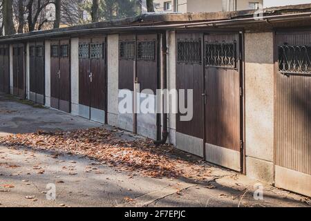 Row of old and socialistic garages or parking boxes made in the sixties in eastern europe. Stock Photo
