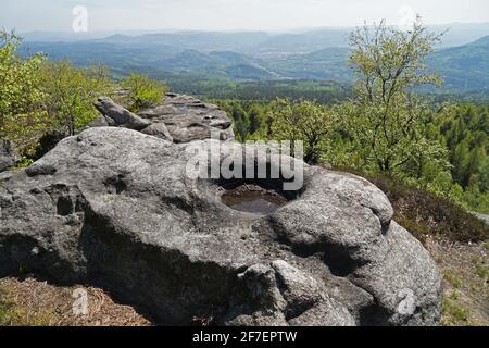 Small lake in rock on Decinsky Sneznik mountain with panoramic aerial view, Czech Republic Stock Photo