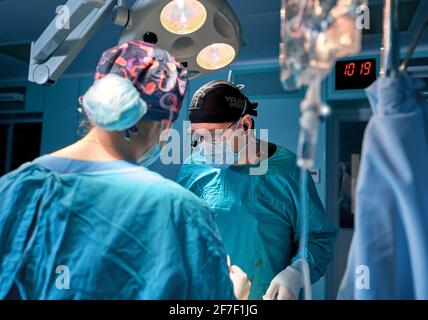 doctors work hard in the operating room Stock Photo