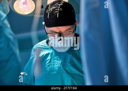 doctors work hard in the operating room Stock Photo