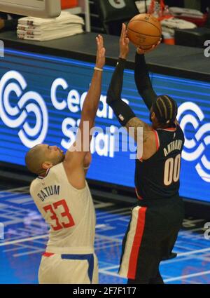 Portland Trail Blazers forward Carmelo Anthony reacts after hitting a 3 ...