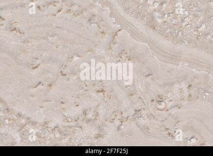 Beige limestone similar to marble natural surface for bathroom or kitchen countertop. High resolution texture and pattern. Stock Photo