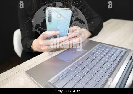 Global network connection concept. Phone, laptop and world map point and line composition, concept of global business. Stock Photo