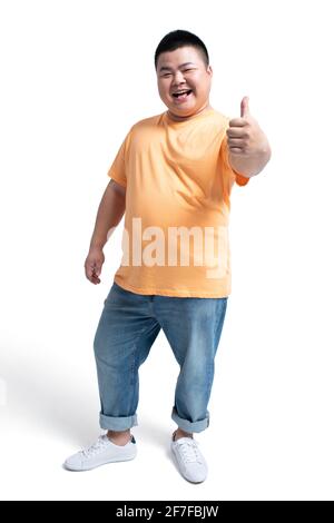 Young man doing thumbs-up Stock Photo