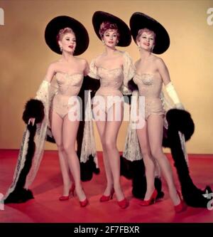 LES GIRLS 1957 MGM film with from left: Mitzi Gaynor, Kay Kendall, Taina Elg Stock Photo