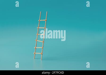 Stepladder into clouds on blue background. Growth or  development concept. Stock Photo