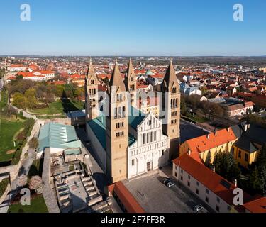 Amazing aerial cityscape about the Pecs city historical downtown and basilica in springtime. Unique medieval mood city in Hungary Stock Photo