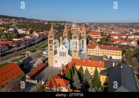Amazing aerial cityscape about the Pecs city historical downtown and basilica in springtime. Unique medieval mood city in Hungary Stock Photo