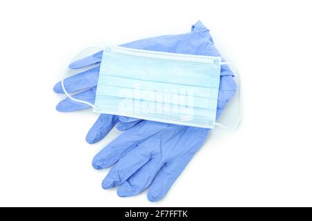 Medical gloves with mask isolated on white background Stock Photo