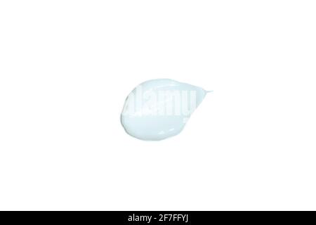 Sunscreen cream smear isolated on white background. Smear of white sunscreen cream isolated on white, skincare texture Stock Photo