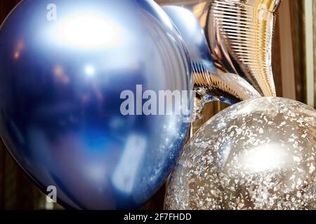 Balloons background texture with blue, silver and transparent colors. Celebration symbols and backgrounds Stock Photo