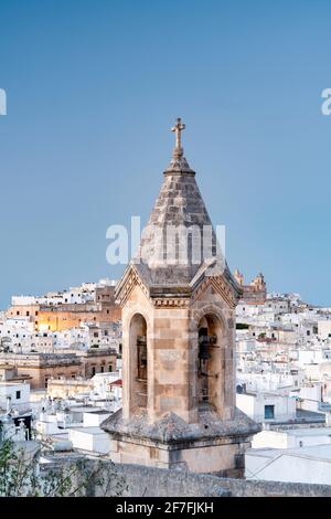 Medieval bell tower and whitewashed houses in the old town of Ostuni, province of Brindisi, Salento, Apulia, Italy, Europe Stock Photo