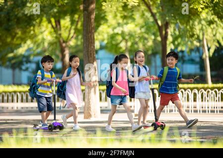 Happy children going to school Stock Photo