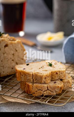 Beer bread on a cooling rack sliced and ready to eat Stock Photo