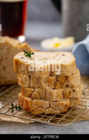 Beer bread on a cooling rack sliced and ready to eat Stock Photo