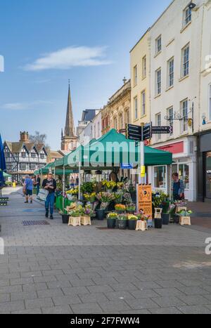 Market day shoppers going about their day under Covid 19 distancing restrictions, Hereford UK. March 2021 Stock Photo