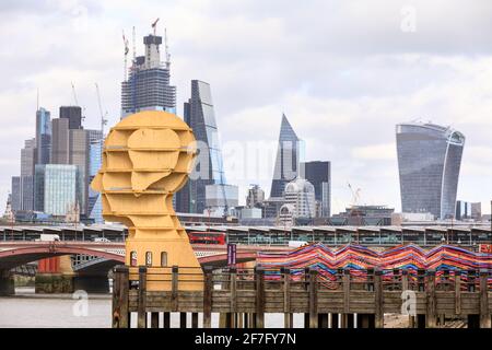 'Head Above Water' wooden sculpture by Steuart Padwick, and François Dumas and Lisa White 'Gateway to Inclusion' installation at Oxo Tower, part of Lo Stock Photo