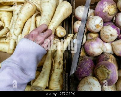 New York City, USA. 29th Mar, 2021. Turnips and parsnips are seen in the produce department of a supermarket in New York on Monday, March 29, 2021. (Photo by Richard B. Levine) Credit: Sipa USA/Alamy Live News Stock Photo