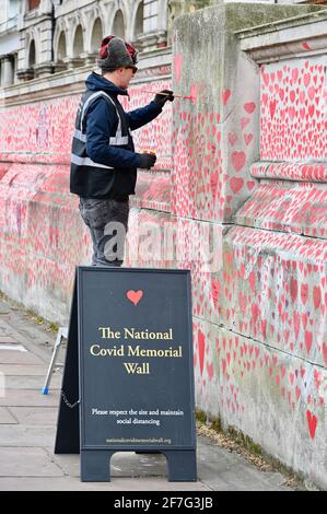 London. UK. Hearts continue to be added to the National Covid Memorial Wall at St. Thomas' Hospital Westminster, in memory of those who have died from coronavirus during the pandemic. Stock Photo