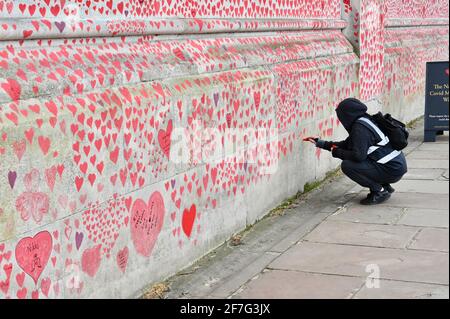 London. UK. Hearts continue to be added to the National Covid Memorial Wall at St. Thomas' Hospital Westminster, in memory of those who have died from coronavirus during the pandemic. Stock Photo