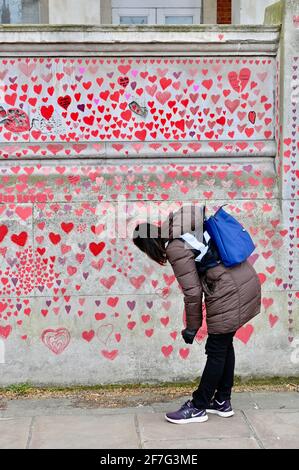 London. UK. Hearts continue to be added to the National Covid Memorial Wall at St. Thomas' Hospital Westminster, in memory of those who have died from coronavirus during the pandemic. Stock Photo