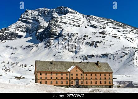 Simplon hospice on the Simplon Pass in winter, Valais, Switzerland Stock Photo