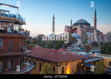 Turkey, Istanbul, View of Seven Hills Hotel rooftop restaurant, Four Seasons Hotel and Haghia Sophia - Aya Sofya Mosque Stock Photo