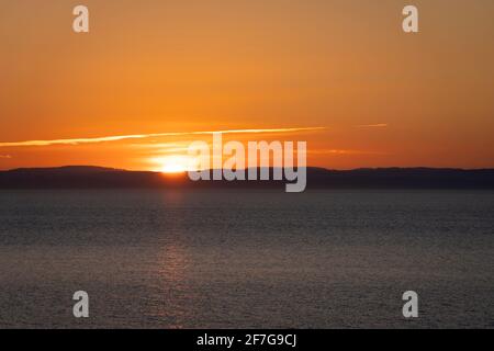 Beautiful sunset along the shores of the St. Lawrence River Stock Photo