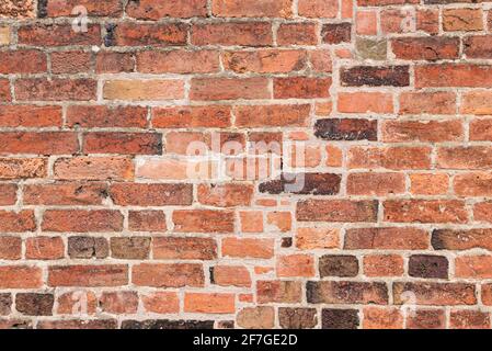 multicoloured Brick wall background variety of bricks brick wall made with old reclaimed bricks in a regular pattern Stock Photo