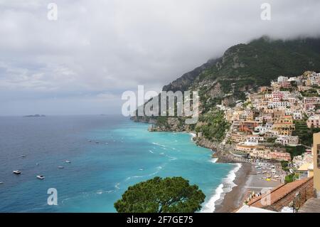 The charming coastal resort village of Positano, Amalfi Coast, Italy. View of the coastline, houses and mountains. Stock Photo