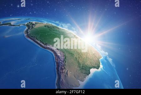 Sunrise through clouds, upon a high detailed satellite view of Planet Earth, focused on South America, Amazon rainforest - Elements furnished by NASA Stock Photo