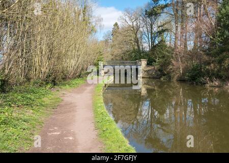 Narrow boats on the Trent and Mersey canal at Great Haywood near Shugborough in Staffordshire, UK Stock Photo