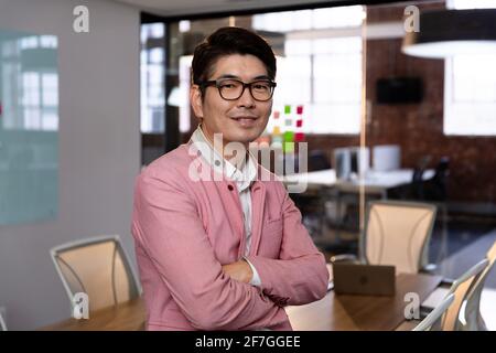 Portrait of stylish asian businessman smiling to camera Stock Photo