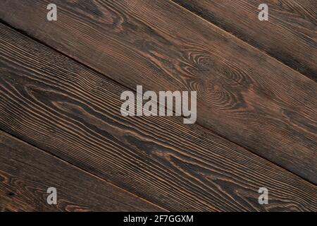 Top view of texture wooden background or natural brown color. Old scuffed and scratched surface. Stock Photo