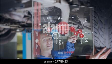 Composition of caucasian man using technological device with car statistics and data Stock Photo