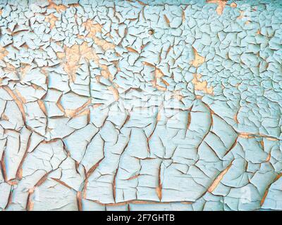 Peeling paint on old blue wall, grunge material decorative texture Stock Photo