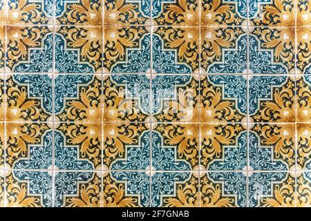 Traditional Portuguese tiles called azulejos on one of the old houses in Faro, Portugal Stock Photo