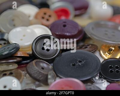 Old clothes buttons in a close-up Stock Photo