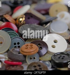 Old clothes buttons in a close-up Stock Photo