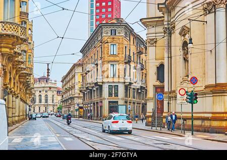 TURIN, ITALY - May 9, 2012: The Via Pietro Micca is located in the city center and boasts many historic edifices, decorated with stucco carvings, bric Stock Photo