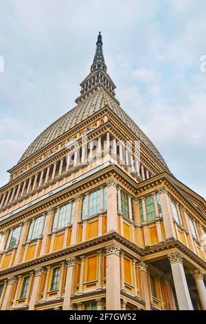 The walls of Mole Antonelliana are decorated with different sized and shaped columns, carved stucco ornaments and big windows, Turin, Italy Stock Photo