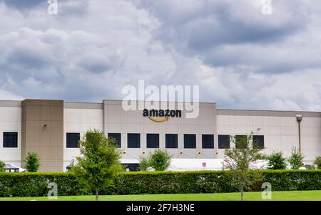 Houston, Texas USA 04-04-2021: Amazon warehouse facility in Houston, TX. American multinational technology company founded in 1994. Stock Photo