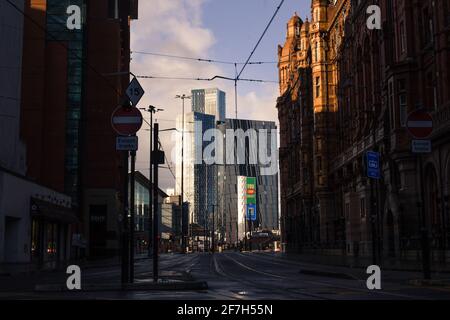 The View Of The Manchester City Skyline During Sunrise Looking Down Lower Mosley Street Including The Midland Hotel And Deansgate Square Towers Stock Photo
