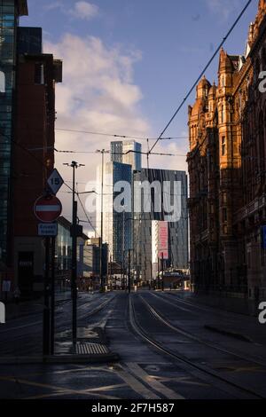 The View Of The Manchester City Skyline During Sunrise Looking Down Lower Mosley Street Including The Midland Hotel And Deansgate Square Towers Stock Photo