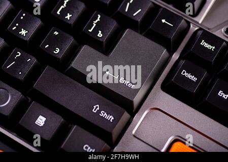Close-up enter button. Computer keyboard close up. Stock Photo